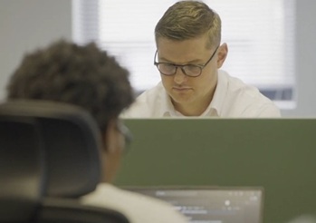 A person looking at a computer screen

AI-generated content may be incorrect.