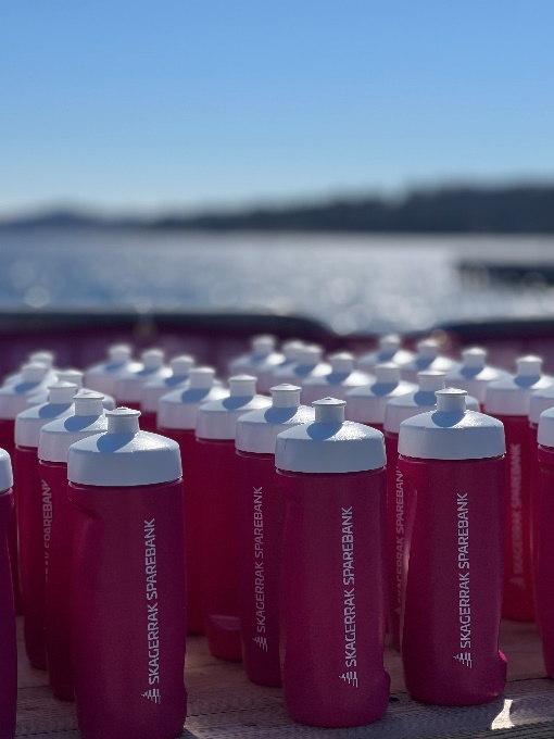 A group of pink water bottles

AI-generated content may be incorrect.