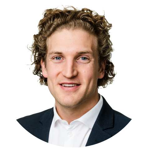 A person with curly hair wearing a suit and white shirt

AI-generated content may be incorrect.